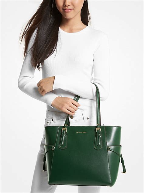 michael michael kors voyager small crossgrain leather tote bag stores|Michael Kors voyager tote sale.